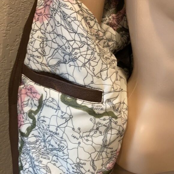 Burks Bay  leather brown coat has a patch on the left side. - Picture 5 of 8